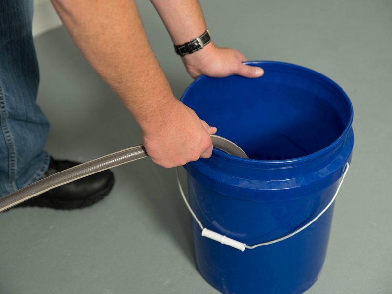 Position bucket to catch water